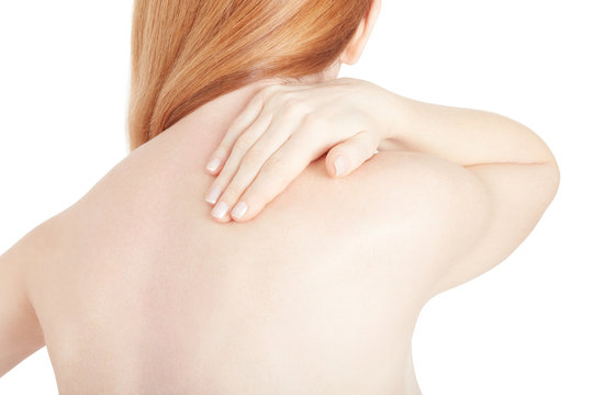 Young woman with scapula pain isolated on white, clipping path