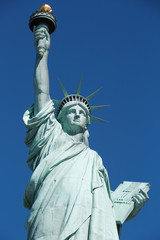 Fototapeta na wymiar Statue of Liberty, blue sky in New York