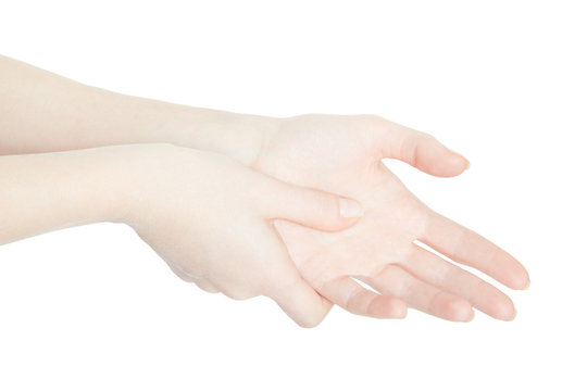 Woman hand touching with thumb the painful palm isolated on white, clipping path