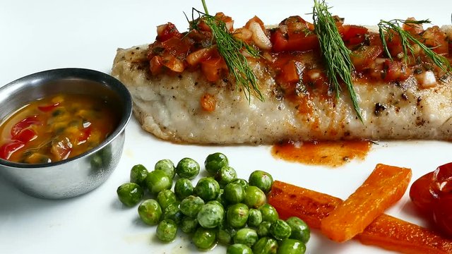Sea bass steak with sauce
