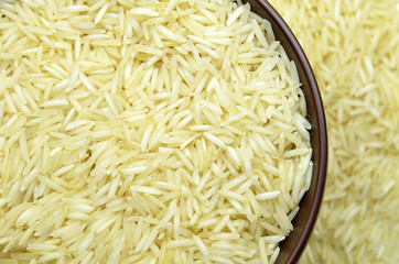 White basmati rice with wooden bowl