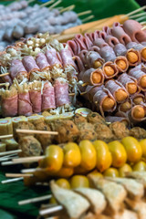 Hed Pun Ham Yang - Thai style barbeque street food on the night market in Chumphon, Bangkok and Isaan