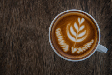  cup of coffee on wooden table. latte art coffee,