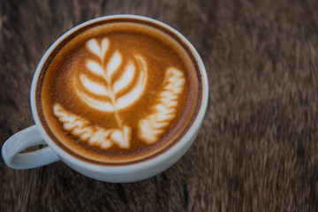  cup of coffee on wooden table. latte art coffee,