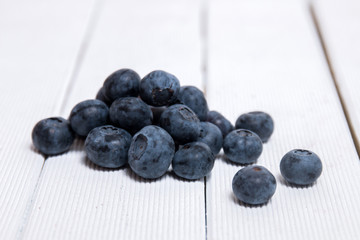 tasty blueberries on white background