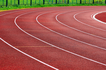 Fototapeta premium Track running, Red treadmill in sport field.