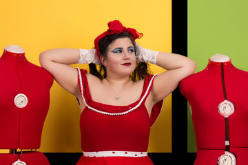 Pinup girl in pop art backdrop