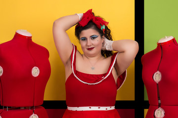 Pinup girl in pop art backdrop