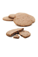 Fototapeta na wymiar chocolate cookies broken on a white background
