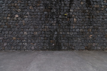 Dark gray stone wall