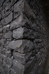 Dark gray stone wall