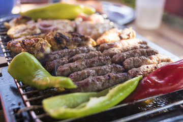 Barbecue with red and green peppers