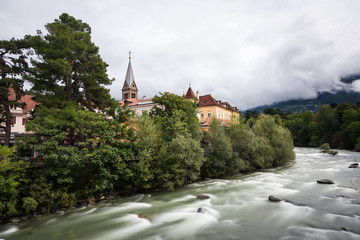 Cityscape of Meran at the Passer river