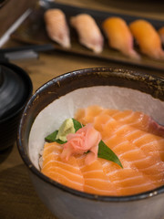 Salmon Donburi Fresh salmon sashimi on vinegared rice, japanese food.