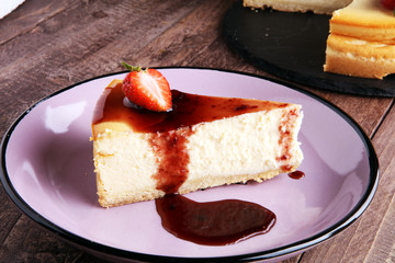 Homemade cheesecake with fresh strawberries and mint for dessert - healthy organic summer dessert pie cheesecake. Vanilla Cheese Cake.