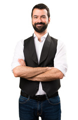 Cool man with his arms crossed on isolated white background