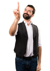 Naklejka premium Cool man touching on transparent screen on isolated white background