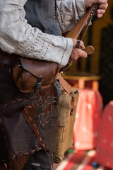 Man plays a rebec instrument © Mauro Rodrigues