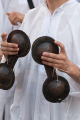Man playing a medieval hand castanets