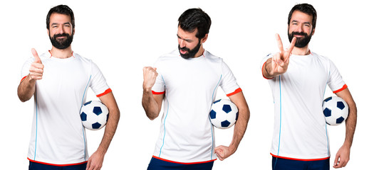 Lucky football player holding a soccer ball