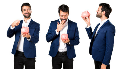 Handsome man holding a piggybank