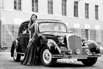 Gorgeous woman at retro car