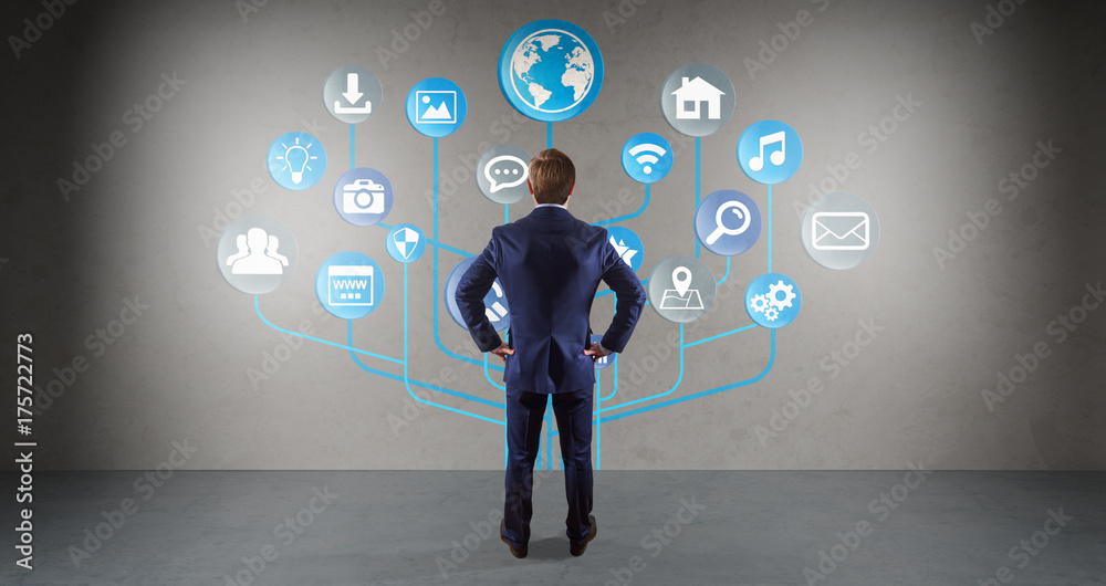 Poster Businessman using social network interface on a wall 3D rendering