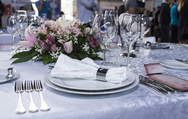 very nice set and decorated table in a restaurant without food