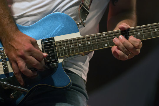Guitar player in concert
