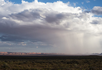 Isolated rainstorm at the Monument Valley with - View from US Hwy 163, Monument Valley, Utah, USA