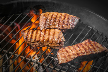 Delicious cooked meat on grill