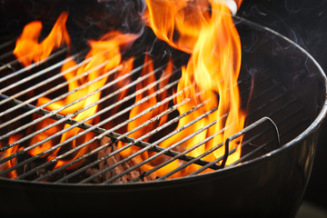 Empty grill with flame