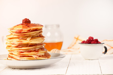 Pancakes with cherry jam copy space