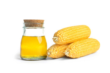 Glass jar with corn oil on white background