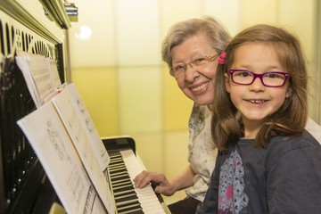 Grandma and Kid Playing the Piano