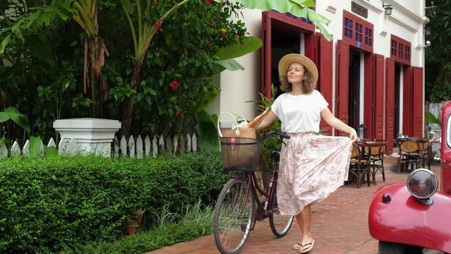 Happy Provence Girl Walking With Bicycle Outdoors. Slow Motion. 4K. 