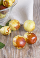 Fresh jujube fruit in a glass bowl.  And closeup.