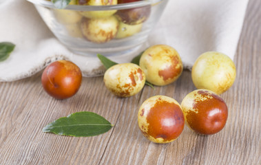 Fresh jujube fruit in a glass bowl.  And closeup.