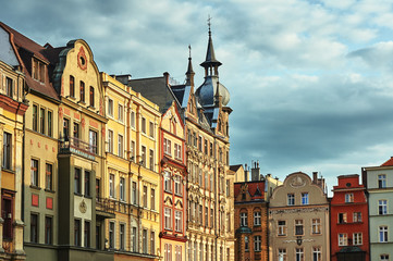Fototapeta na wymiar Facades of historic tenement houses on the market in Swidnica in Poland.