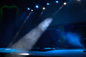 dj performing on a stage