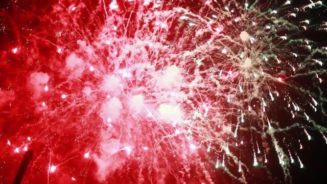 Beautiful colorful firework bursts in the night sky. 1920x1080