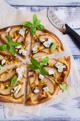 Traditional pizza with pear