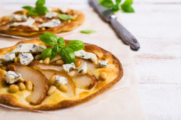 Traditional pizza with pear