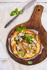 Traditional pizza with pear