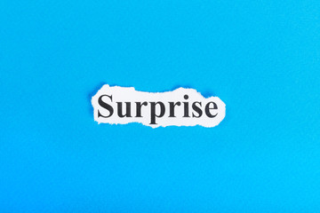 Surprise text on paper. Word Surprise on torn paper. Concept Image