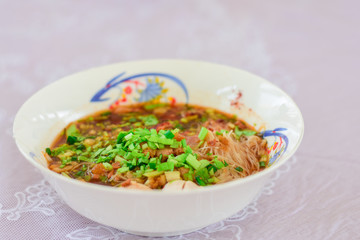 Chinese noodle soup with pork.