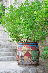 An old barrel with painted houses  © konik60