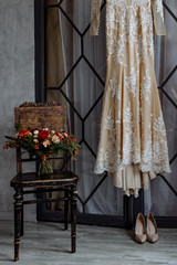 Beautiful bright colourful wedding bouquet on a chair