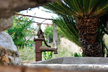 Old cast iron garden pump. © konik60