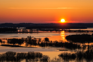 Sunset over the basins river Narew somewhere on Podlasie, Poland